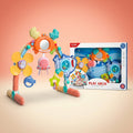Baby play arch with hanging crab mirror and sensory toys beside its retail box