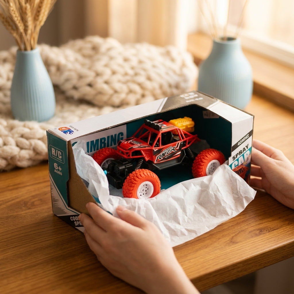 Hands opening the RC climbing buggy box to reveal the red vehicle